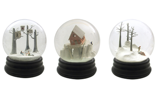Illustration for article titled Super Creepy Snow Globes are Filled With Death, Not Cheer